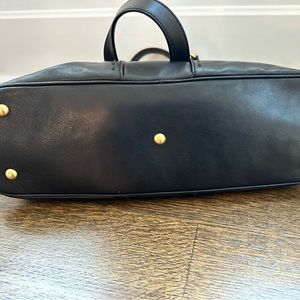 Yves Saint Laurent “The Muse” Black and in practically brand new condition.